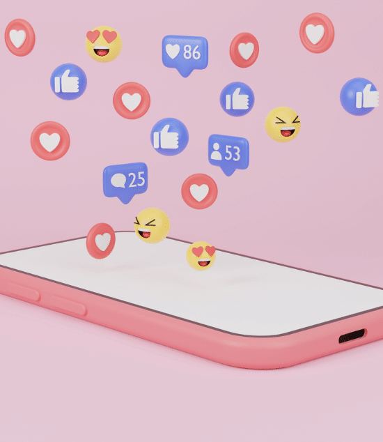 Various thumbs up, heart, and smiling face emojis flying out of a pink cellphone represent the viral possibility of paid social media campaigns